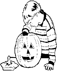 Boy carving a pumpkin